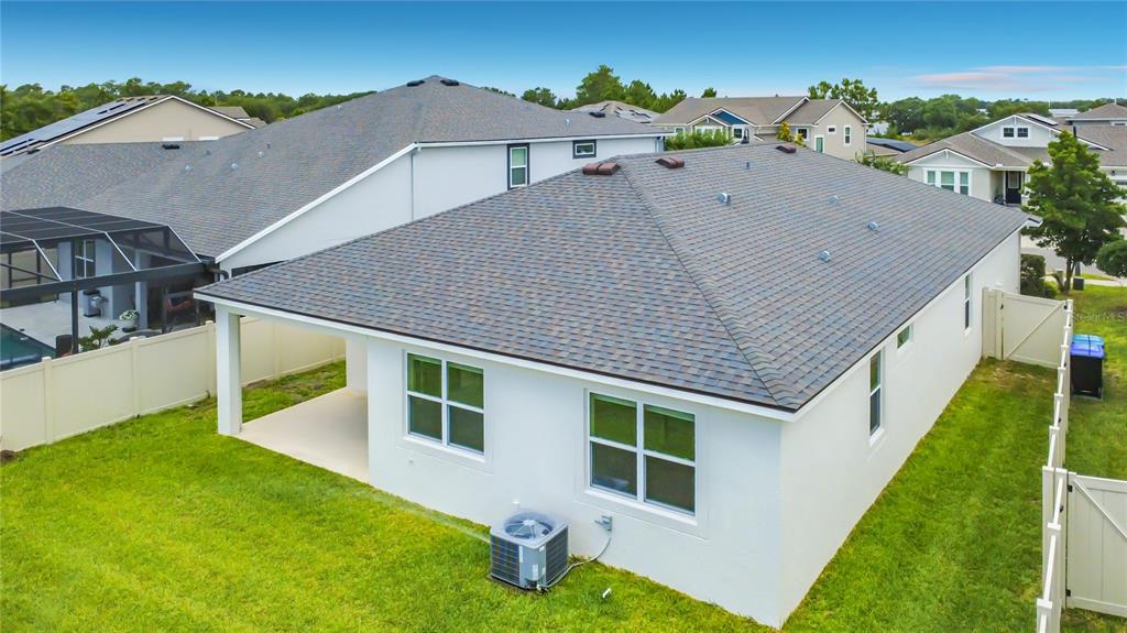 16822 Wingspread Loop Winter Garden, FL 34787 - Photo 43 of 47 a house view with a garden space