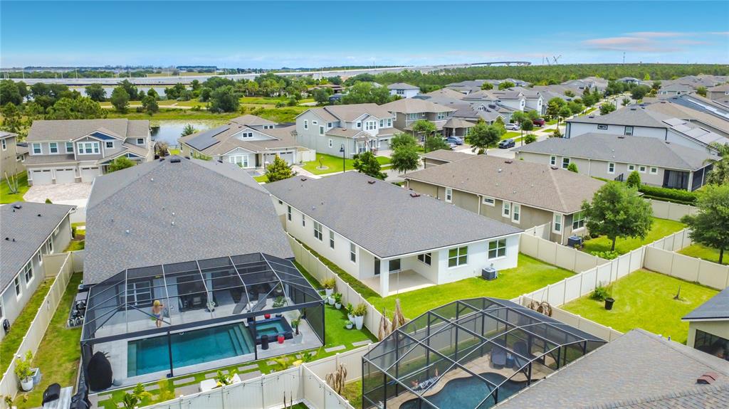 16822 Wingspread Loop Winter Garden, FL 34787 - Photo 46 of 47 an aerial view of residential houses with outdoor space and ocean view