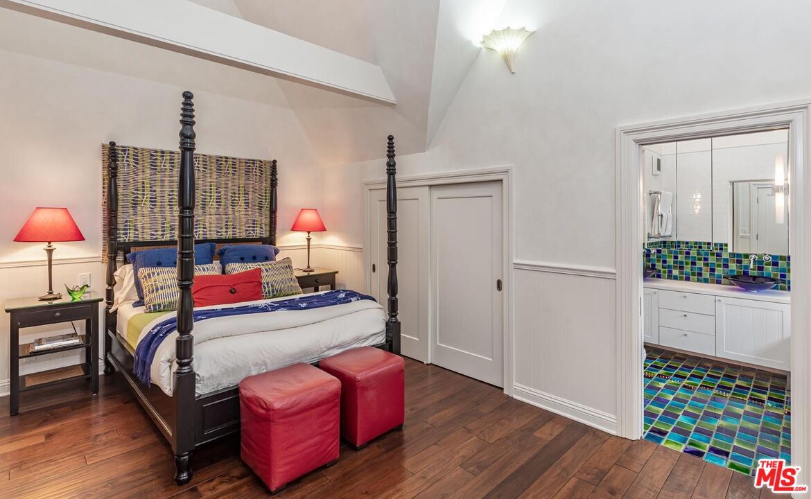 23416 Malibu Colony Road Malibu, CA 90265 - Photo 20 of 26 a bedroom with furniture and a wooden floor