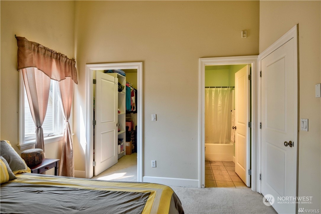 3315 Rockefeller Avenue, Unit 4 Everett, WA 98201 - Photo 24 of 29 a view of bedroom with a bed and wooden floor