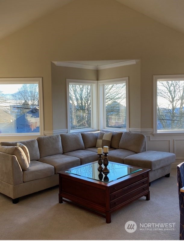 3315 Rockefeller Avenue, Unit 4 Everett, WA 98201 - Photo 8 of 29 a living room with furniture and a large window