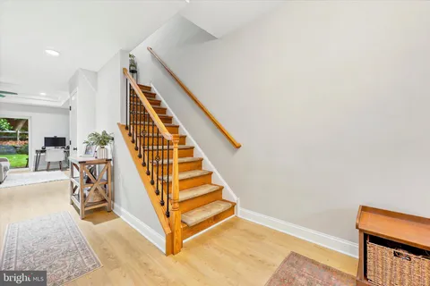 a view of entryway with wooden floor