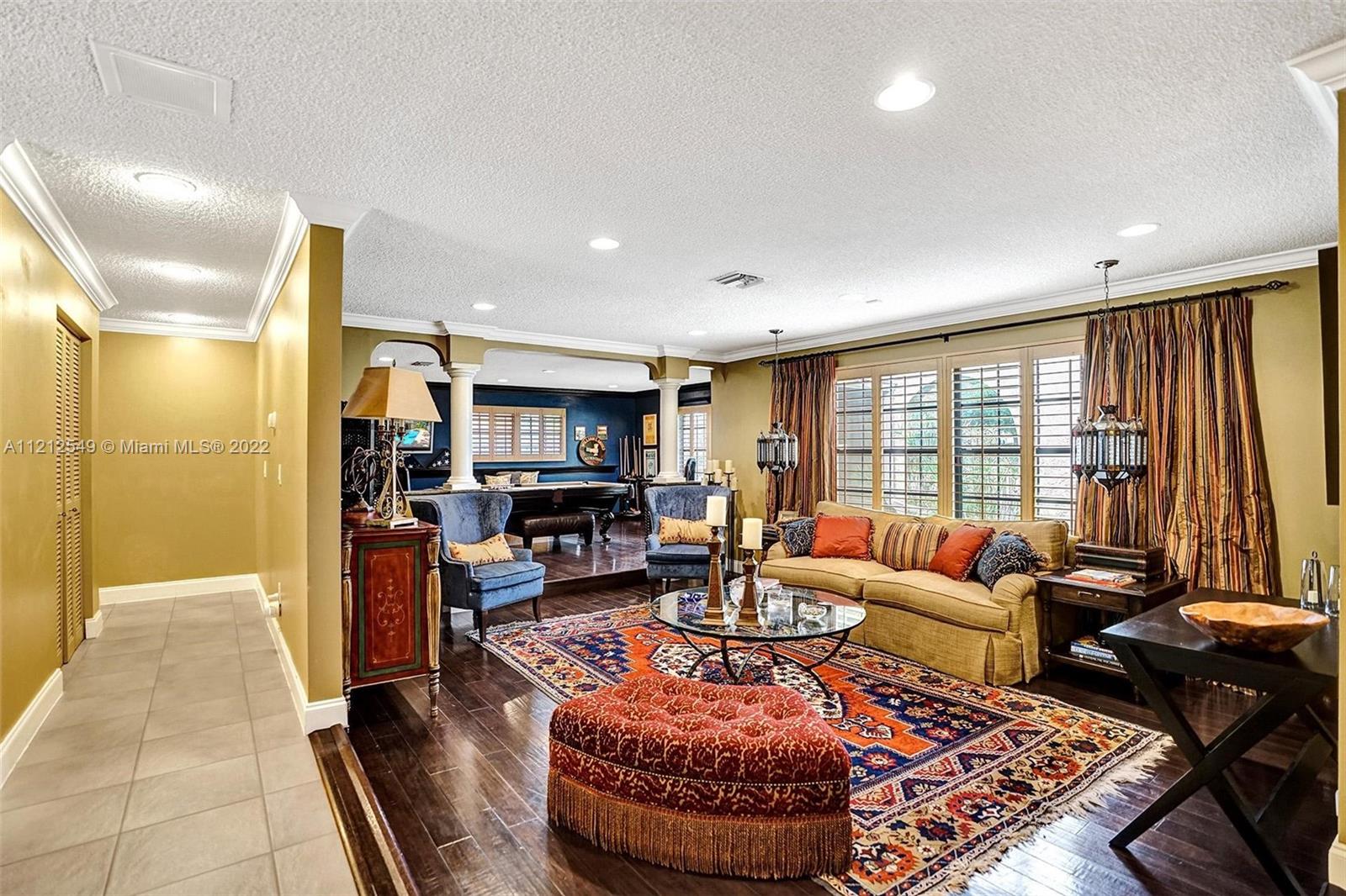 7360 Southwest 16th Street Plantation, FL 33317 - Photo 15 of 70 a living room with furniture and a large window