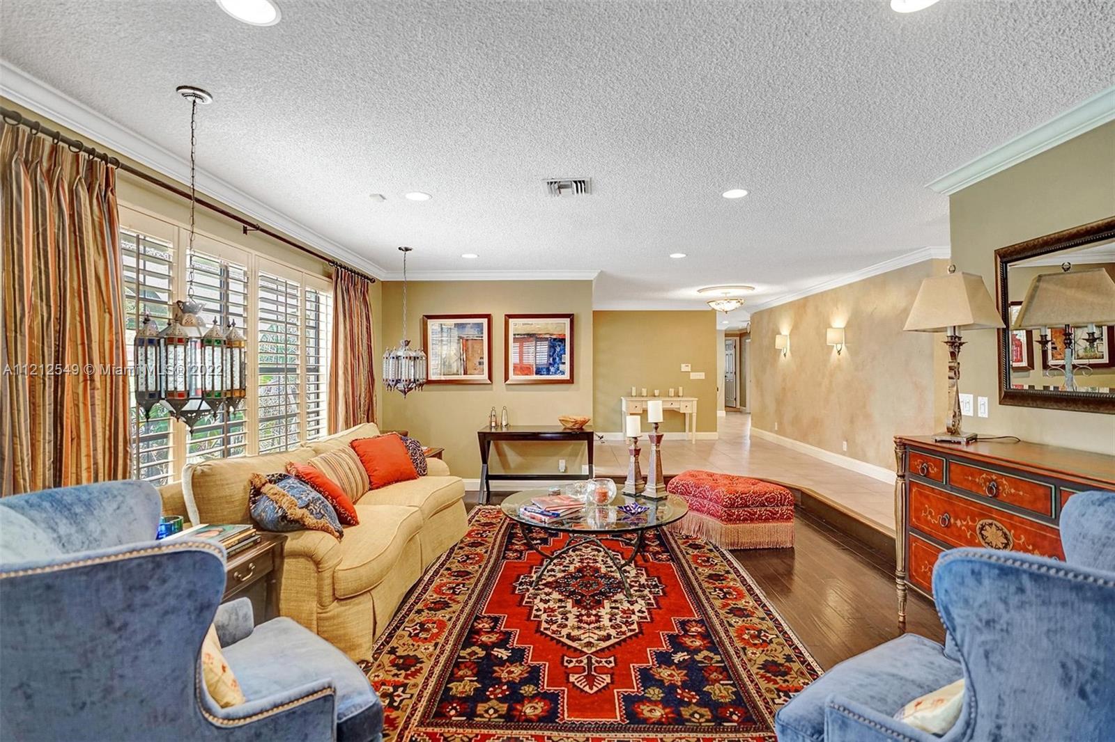 7360 Southwest 16th Street Plantation, FL 33317 - Photo 18 of 70 a living room with furniture and a large window