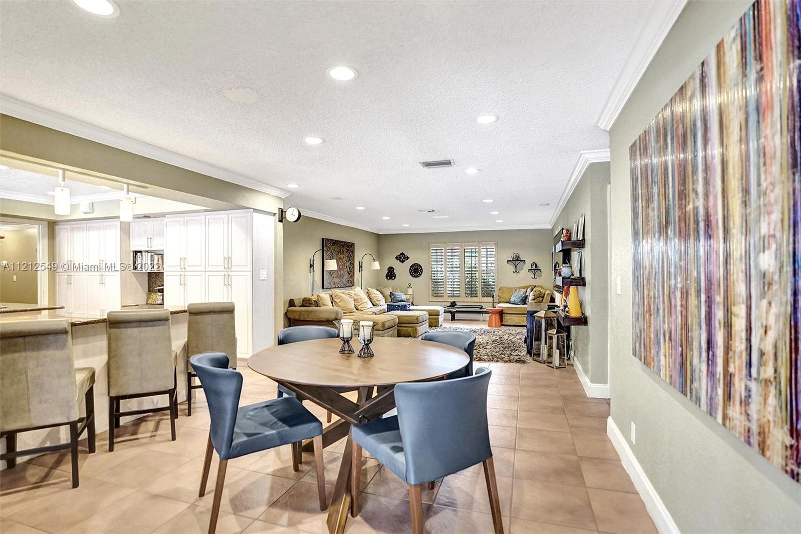7360 Southwest 16th Street Plantation, FL 33317 - Photo 33 of 70 a view of a dining room with furniture