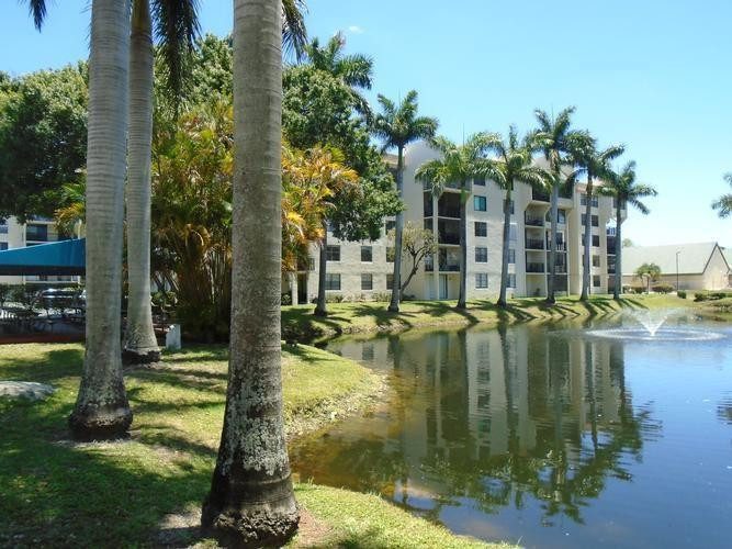 6195 Rock Island Road, Unit 402 Tamarac, FL 33319 - Photo 19 of 23 a view of swimming pool