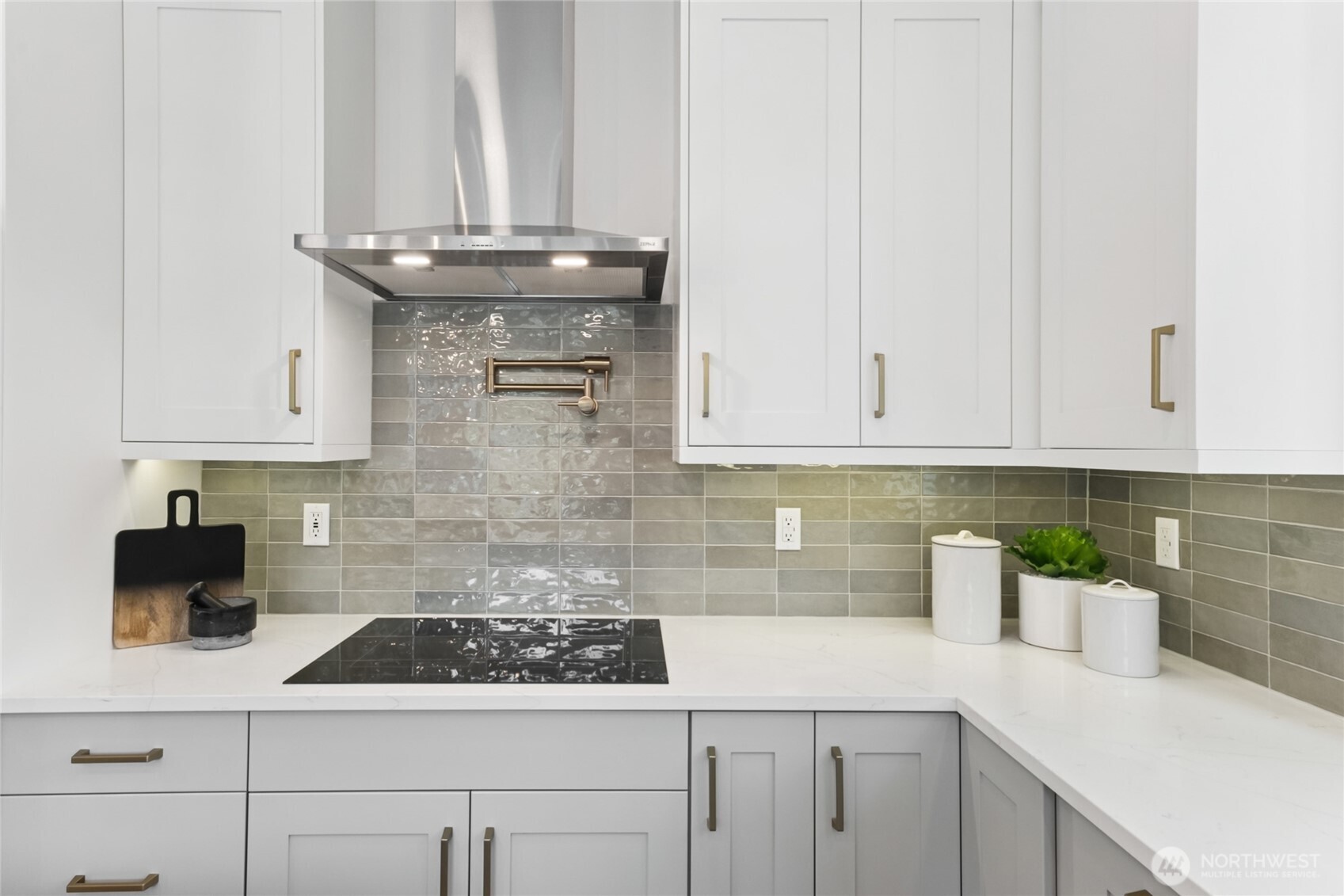 18809 99th Place Northeast, Unit C Bothell, WA 98011 - Photo 19 of 35 a kitchen with stainless steel appliances granite countertop white cabinets and a stove