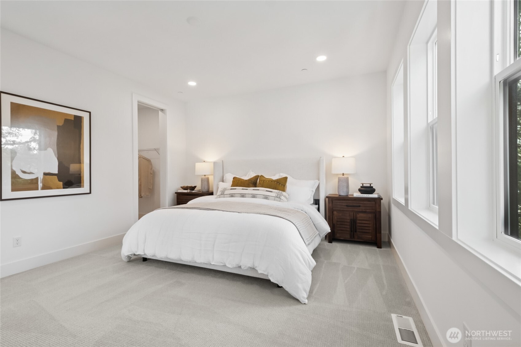 18809 99th Place Northeast, Unit C Bothell, WA 98011 - Photo 31 of 35 a bedroom with a bed and a window