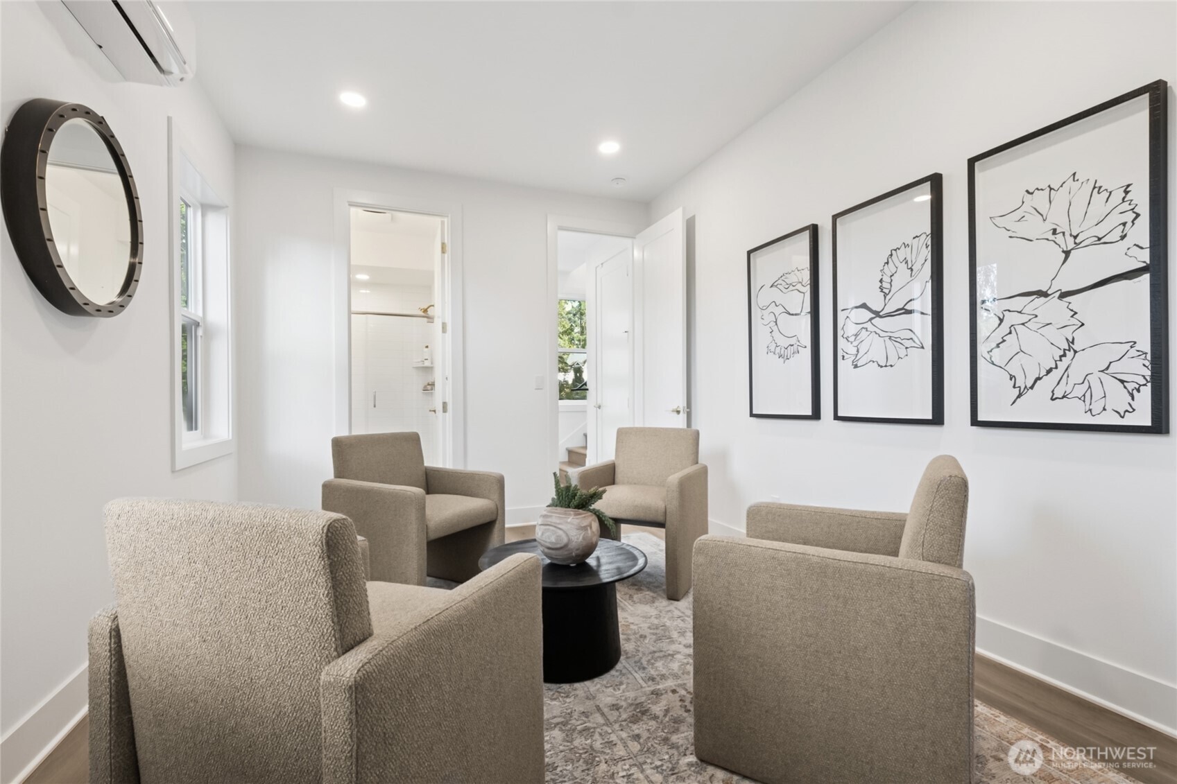 18809 99th Place Northeast, Unit C Bothell, WA 98011 - Photo 4 of 35 a living room with furniture a rug and a window