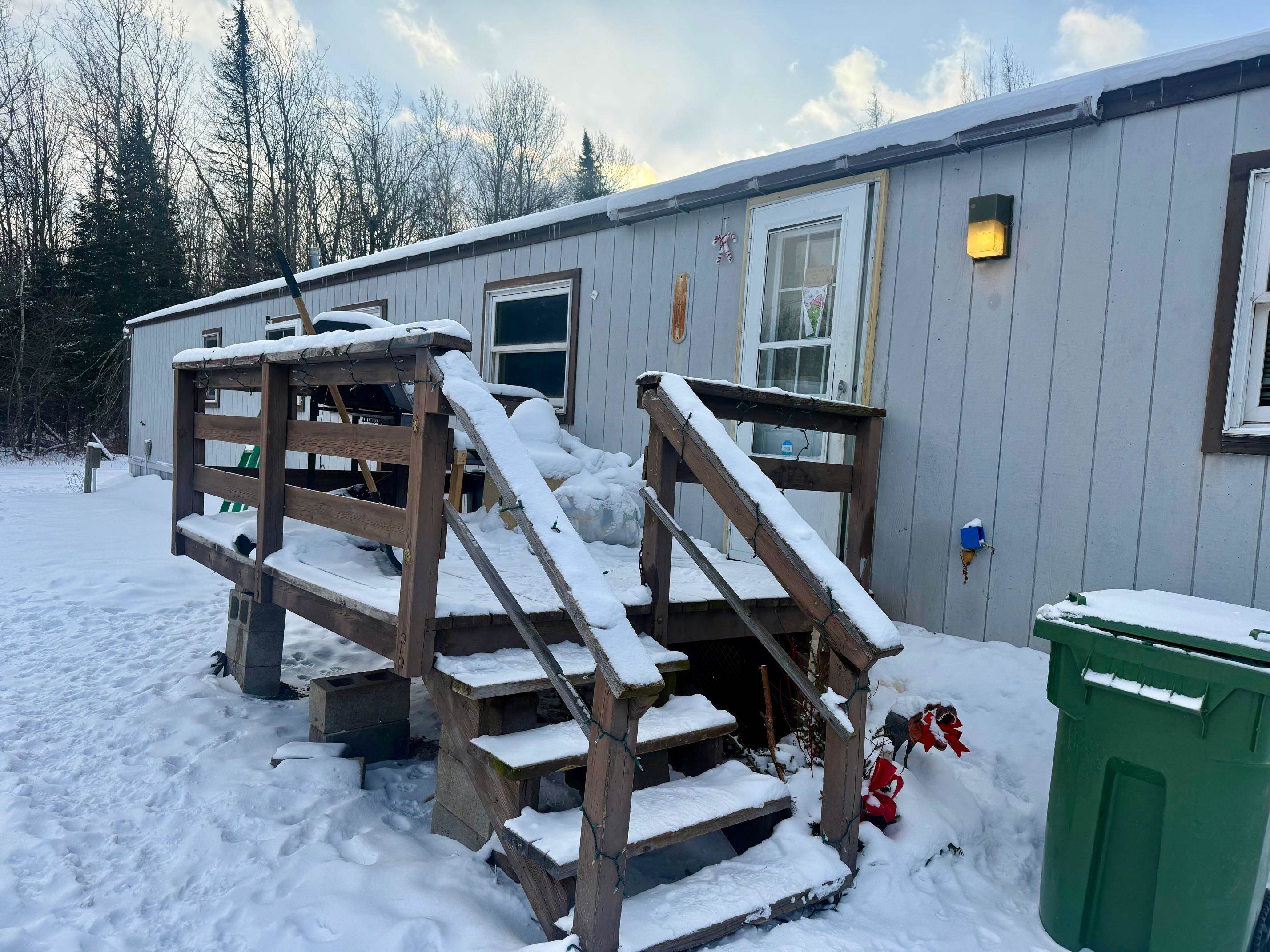3031 South Leighton Road Hibbing, MN 55746 - Photo 2 of 8 View of snow covered deck