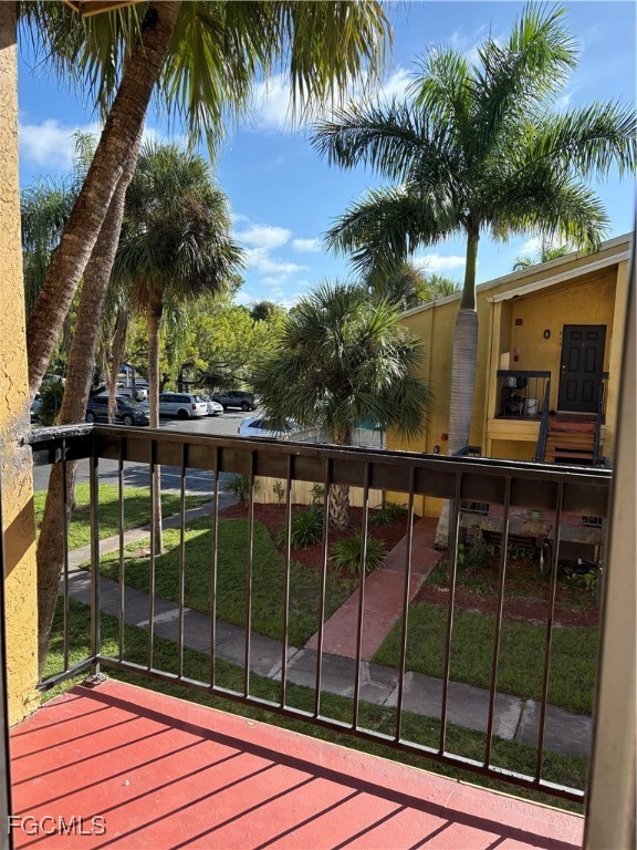 2855 Winkler Avenue, Unit 113 Fort Myers, FL 33916 - Photo 16 of 24 a view of a houses with palm trees