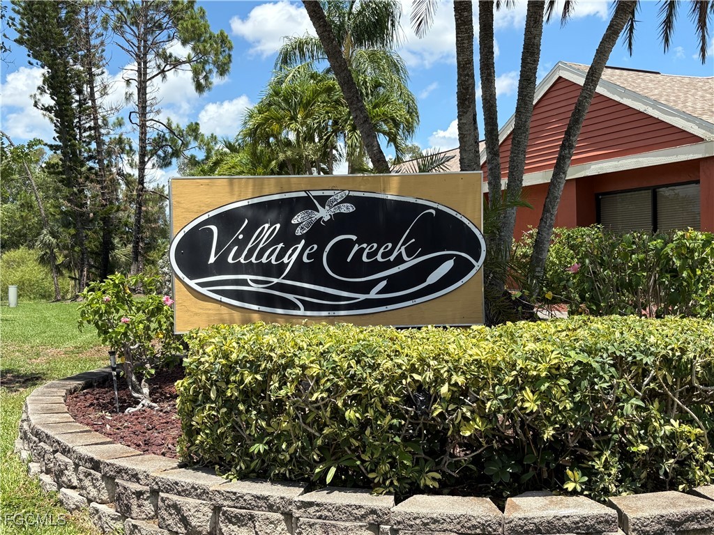 2855 Winkler Avenue, Unit 113 Fort Myers, FL 33916 - Photo 20 of 24 a front view of a house with garden