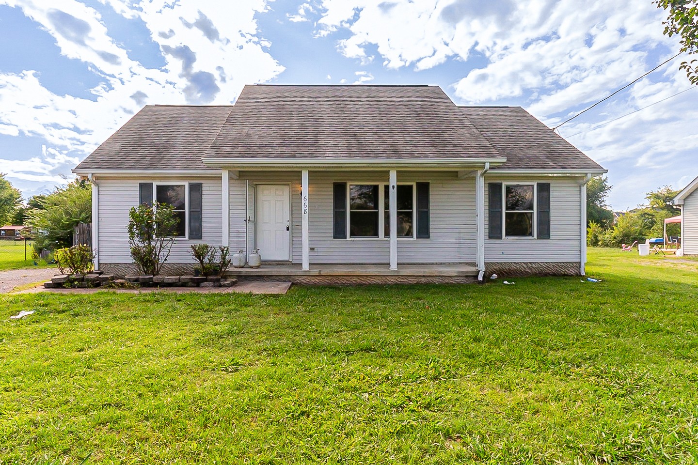 668 Crescent Road Murfreesboro, TN 37128 - Photo 1 of 24 a view of a house with backyard and sitting area