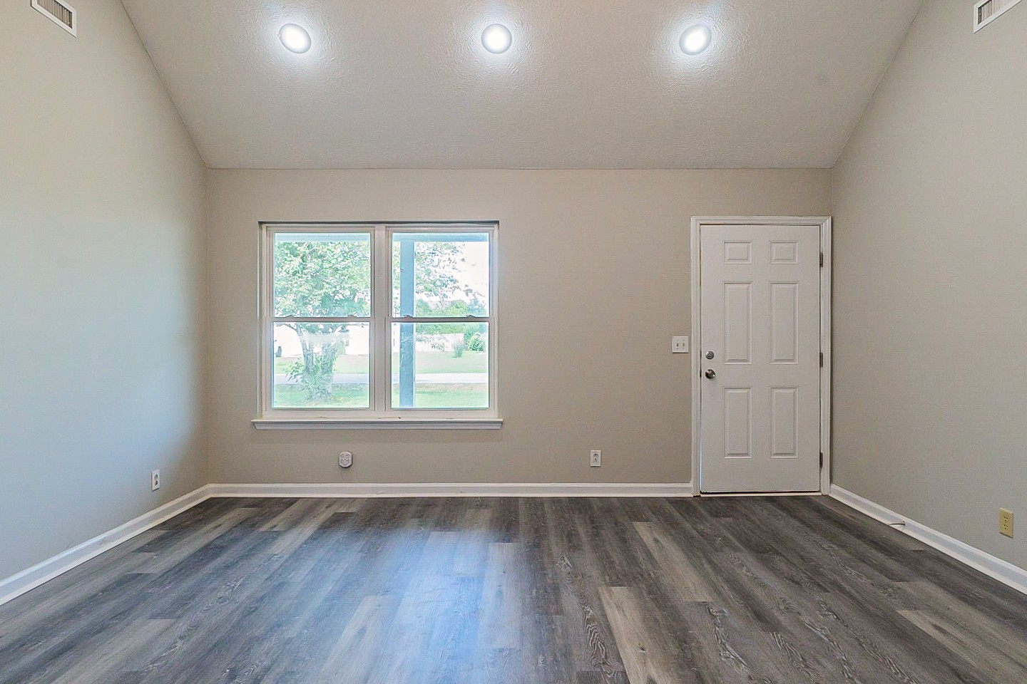 668 Crescent Road Murfreesboro, TN 37128 - Photo 3 of 24 an empty room with wooden floor and window