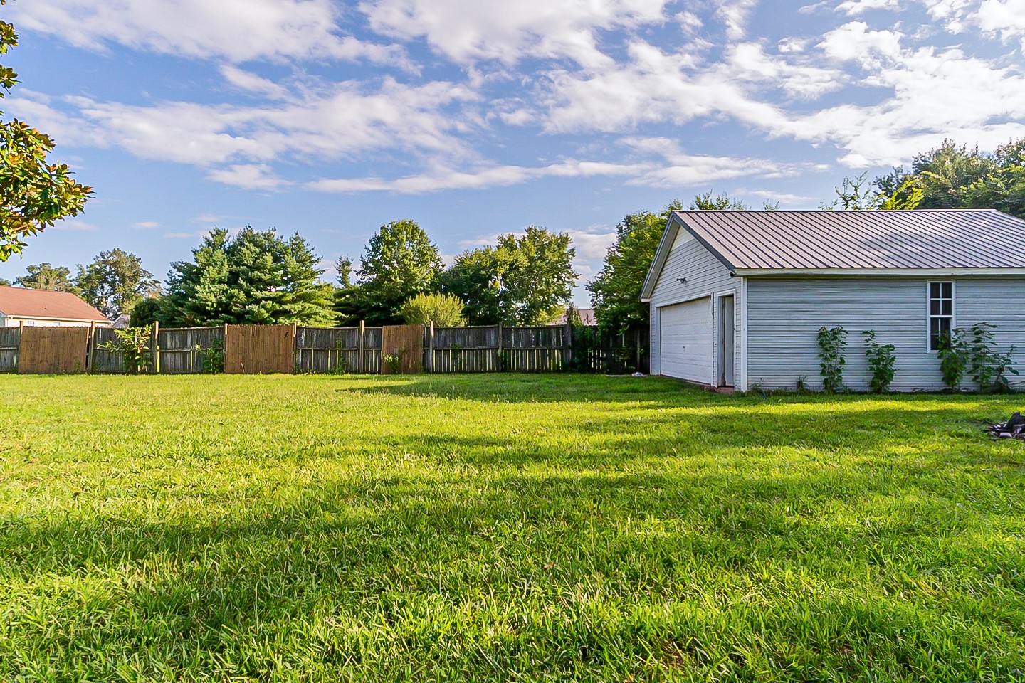 668 Crescent Road Murfreesboro, TN 37128 - Photo 24 of 24 a view of a house with a backyard