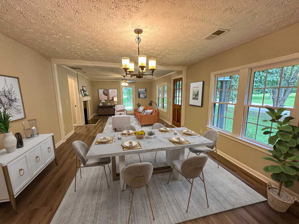 558 Macedonia Road Newnan, GA 30263 - Photo 14 of 44 a view of a dining room with furniture wooden floor and chandelier