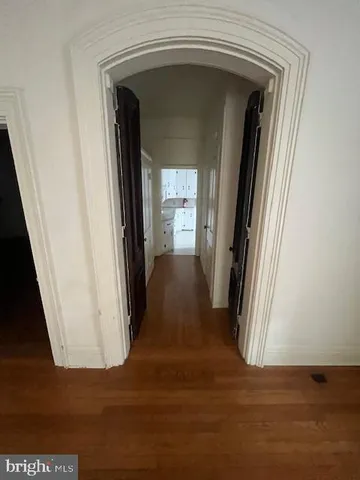 a view of a livingroom from a hallway