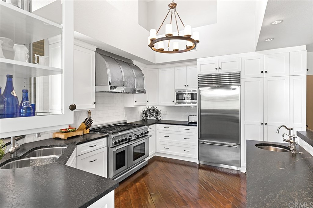 13 Guadalmina Drive Dana Point, CA 92629 - Photo 9 of 26 a kitchen with stainless steel appliances a stove a sink and cabinets