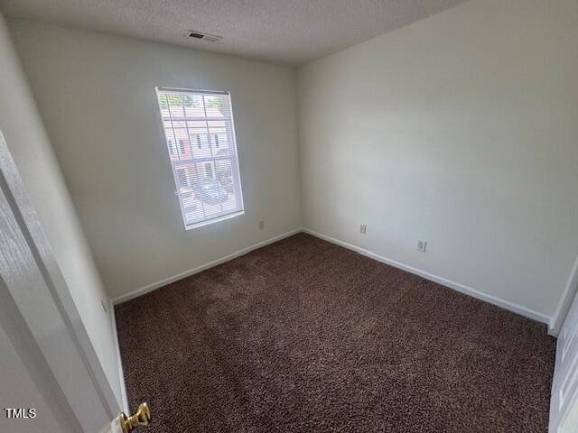 3363 Bridgeville Road Raleigh, NC 27610 - Photo 9 of 10 an empty room with windows