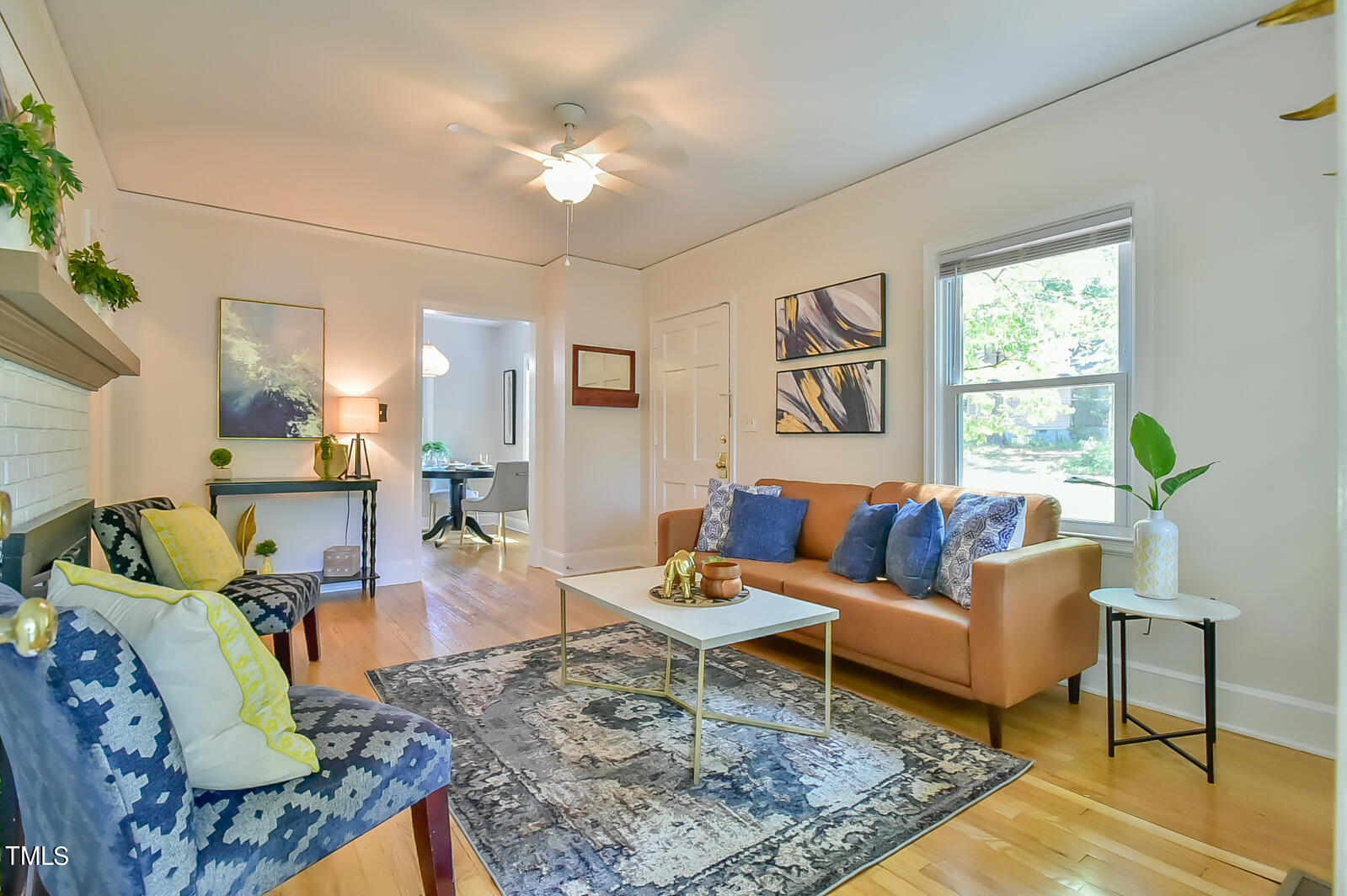 2605 Elgin Street Durham, NC 27704 - Photo 12 of 39 a living room with furniture and a large window