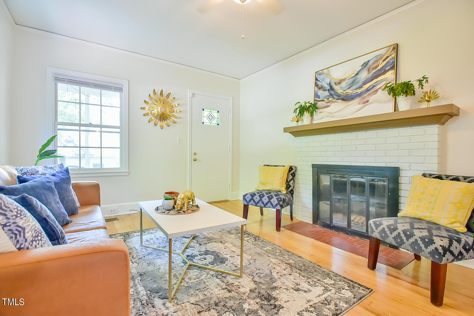 2605 Elgin Street Durham, NC 27704 - Photo 13 of 39 a living room with furniture and a fireplace