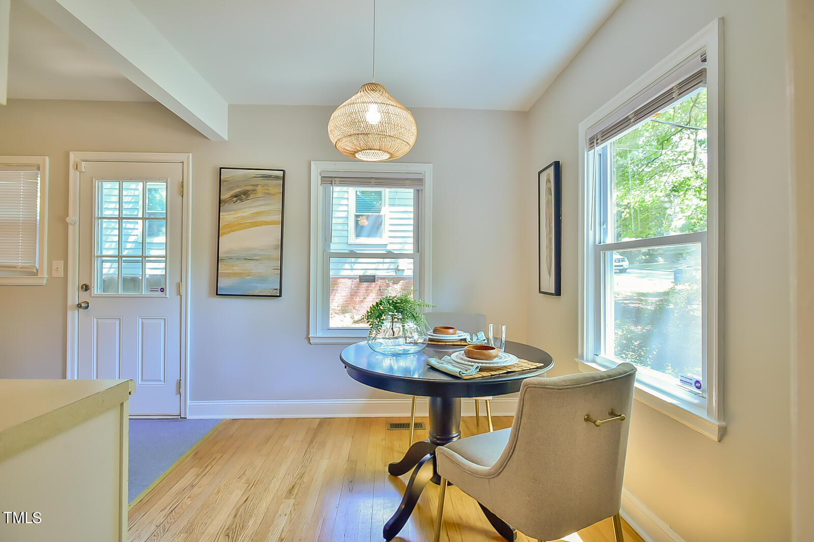 2605 Elgin Street Durham, NC 27704 - Photo 14 of 39 a view of a dining room with furniture window and wooden floor