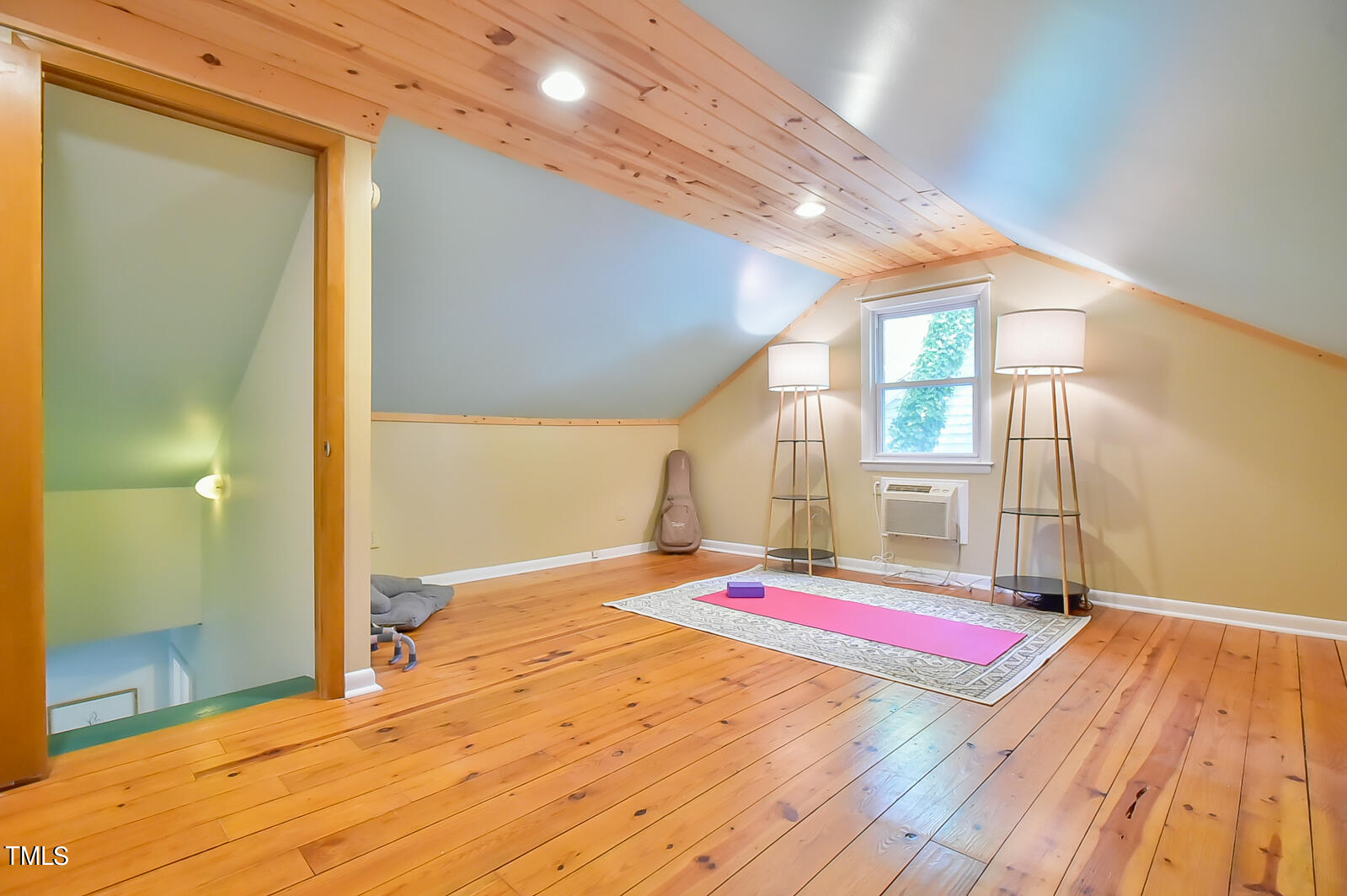 2605 Elgin Street Durham, NC 27704 - Photo 30 of 39 a room with wooden floor and glass door