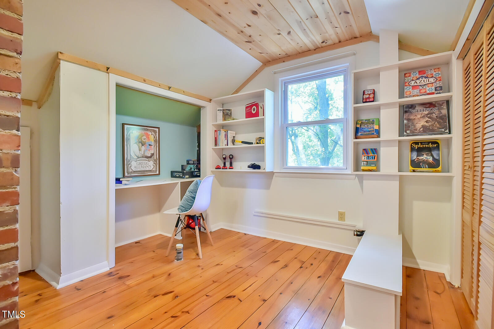 2605 Elgin Street Durham, NC 27704 - Photo 32 of 39 a room with window closet and furniture