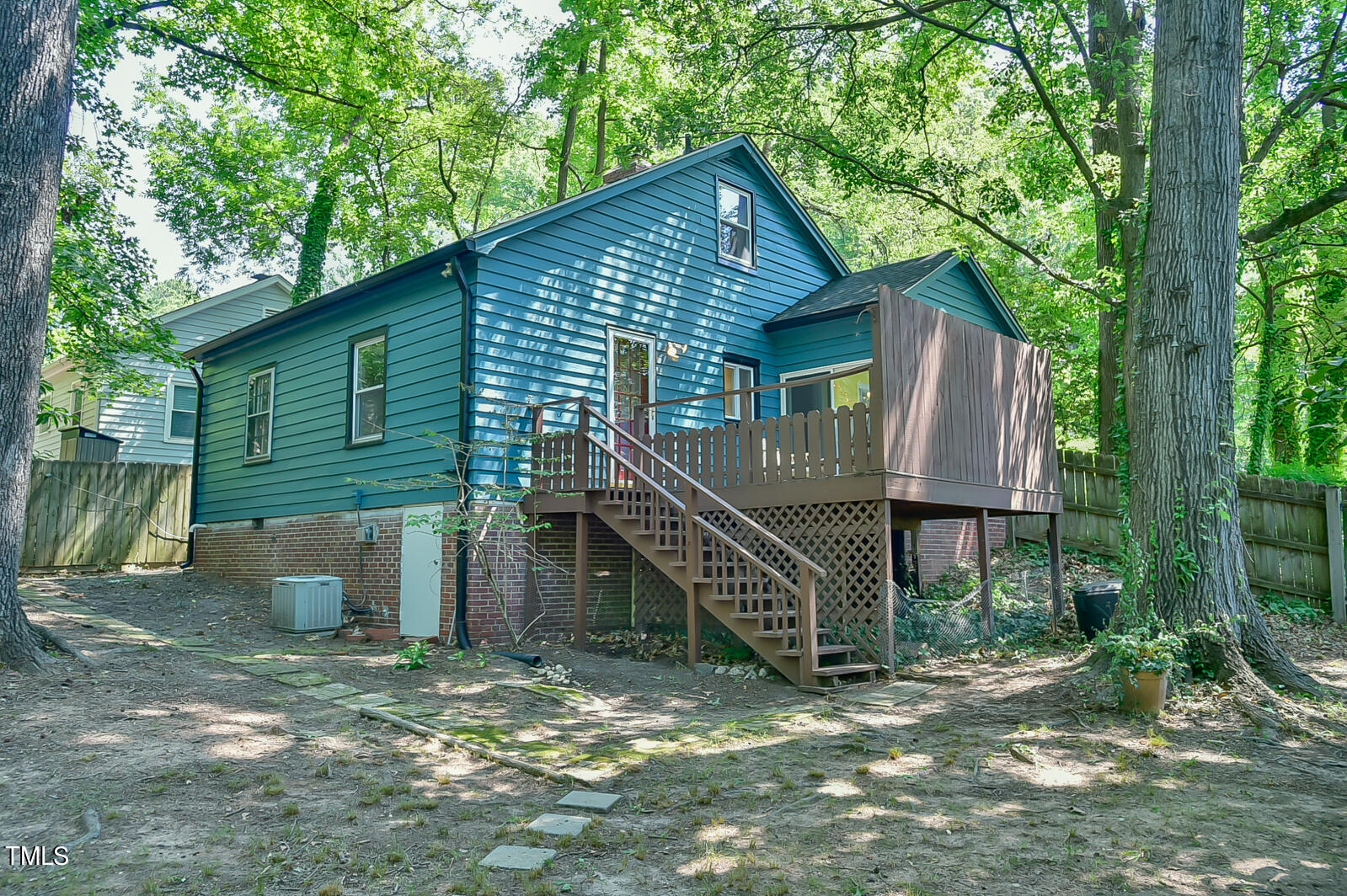 2605 Elgin Street Durham, NC 27704 - Photo 39 of 39 a view of a house with a yard and trees