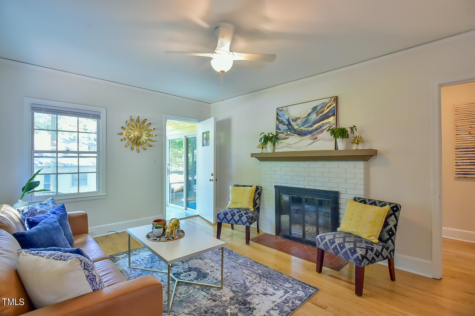 2605 Elgin Street Durham, NC 27704 - Photo 5 of 39 a living room with furniture and a fireplace
