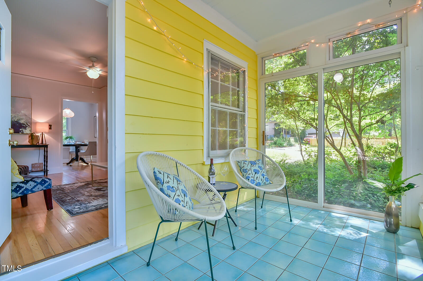 2605 Elgin Street Durham, NC 27704 - Photo 7 of 39 a balcony with table and chairs