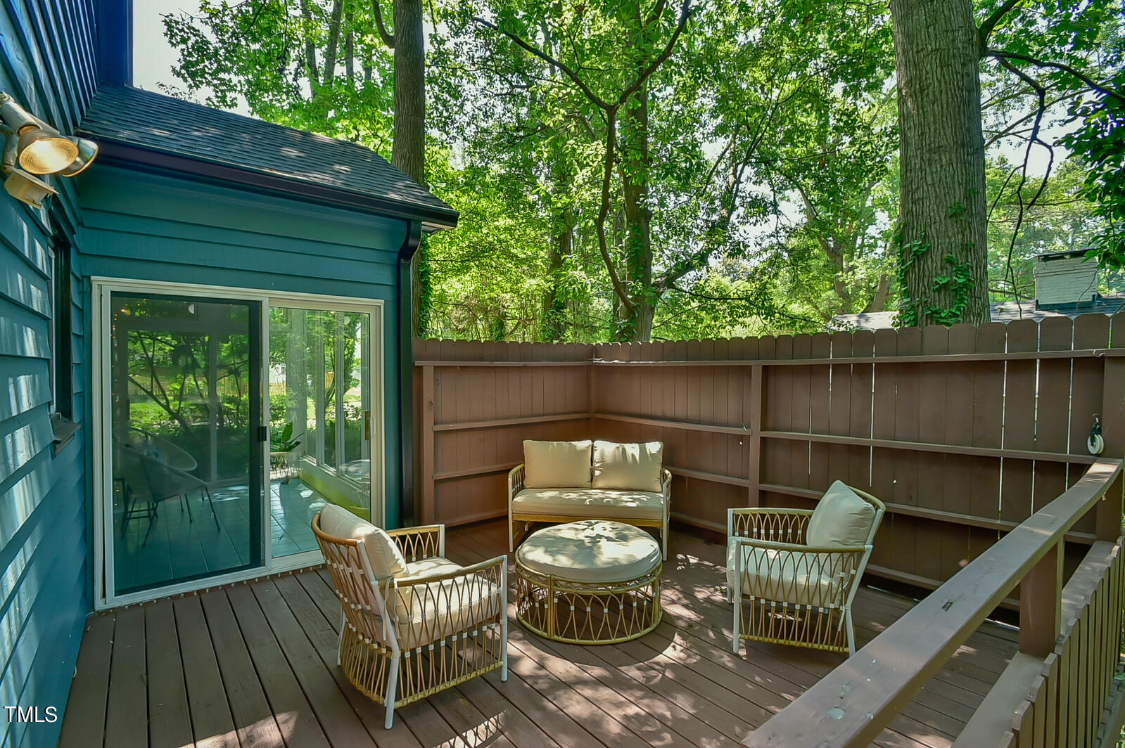 2605 Elgin Street Durham, NC 27704 - Photo 10 of 39 a view of deck with furniture and trees in the front
