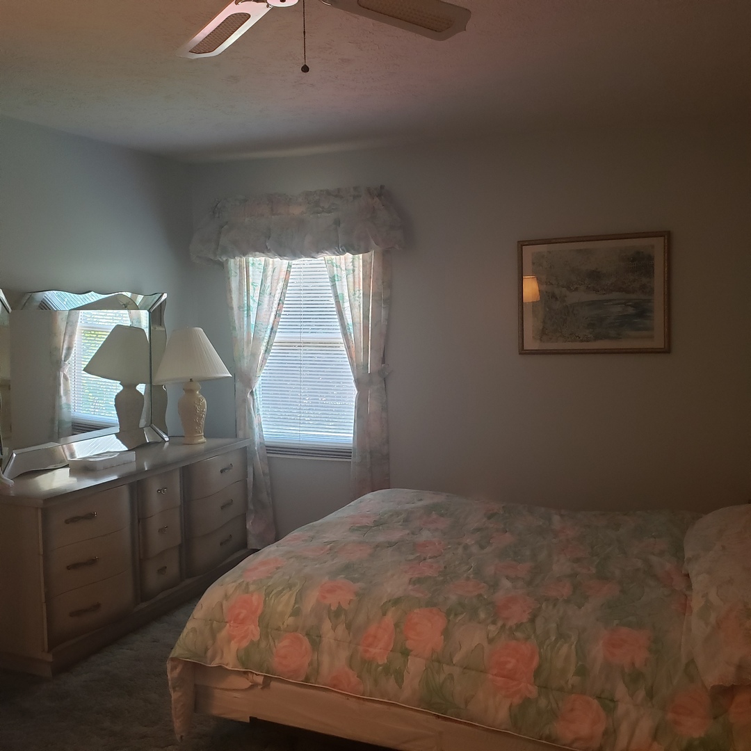 1017 Morgan Street Normal, IL 61761 - Photo 11 of 15 a bedroom with a bed and a window