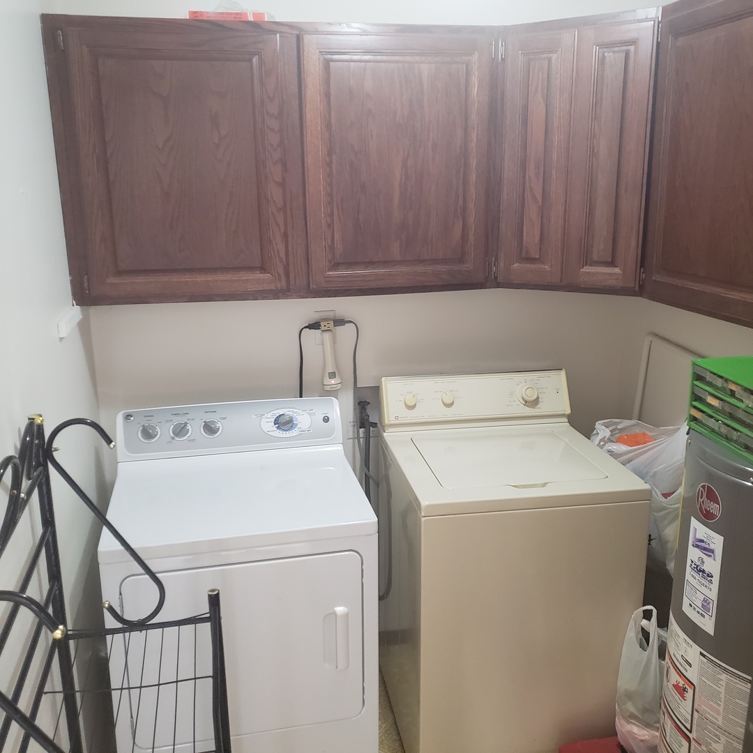 1017 Morgan Street Normal, IL 61761 - Photo 14 of 15 a utility room with dryer and washer