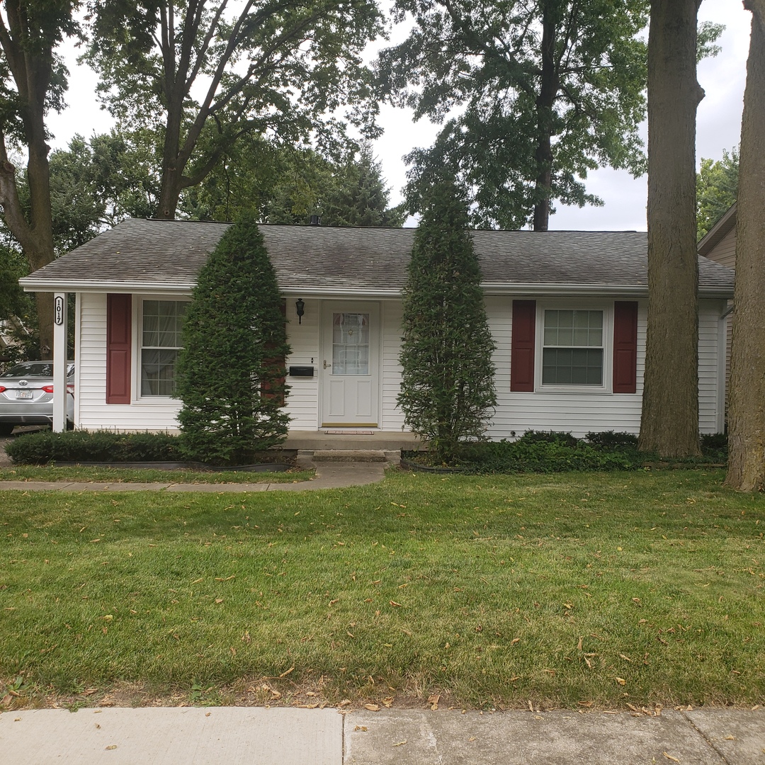 1017 Morgan Street Normal, IL 61761 - Photo 2 of 15 a front view of a house with garden