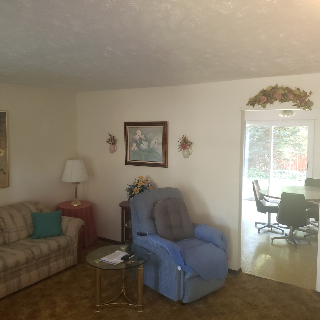 1017 Morgan Street Normal, IL 61761 - Photo 9 of 15 a living room with furniture and a large window