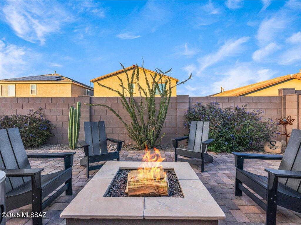 11913 East Ryscott Circle Vail, AZ 85641 - Photo 37 of 43 Backyard Firepit