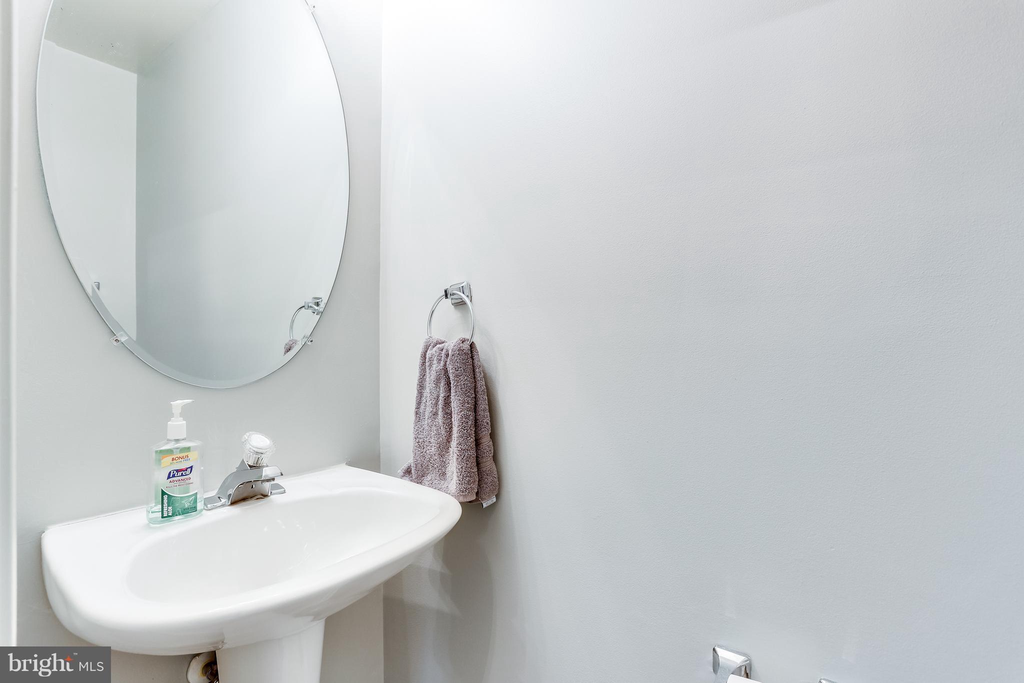 6514 Ridgeborne Drive Baltimore, MD 21237 - Photo 13 of 31 Main Floor Powder Room