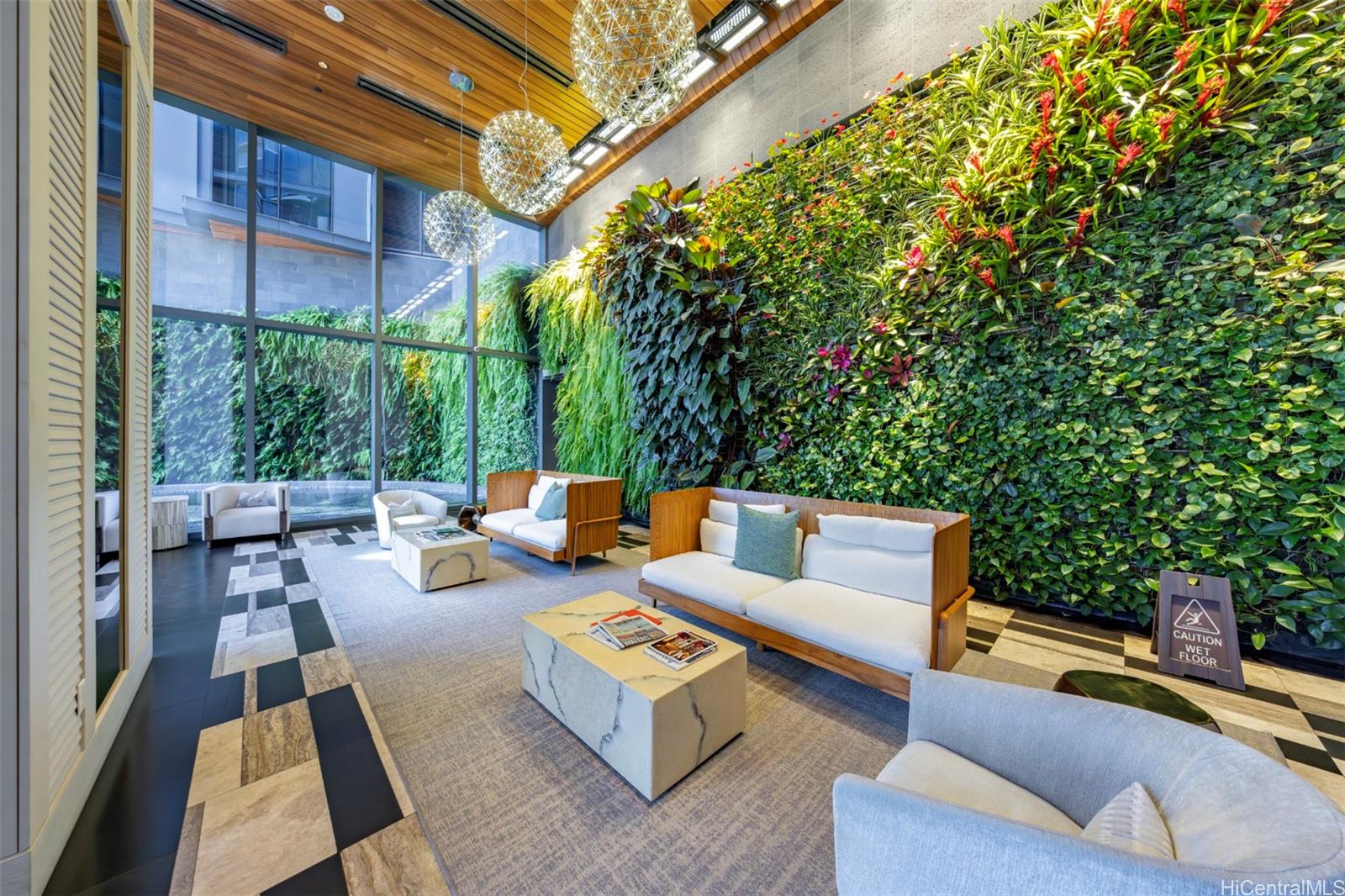 1108 Auahi Street, Unit 3300 Honolulu, HI 96814 - Photo 19 of 25 a outdoor living space with furniture and garden view