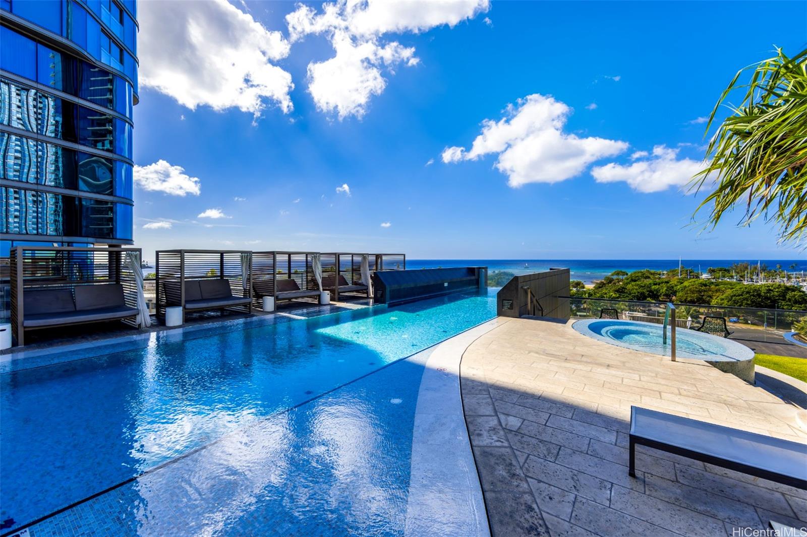1108 Auahi Street, Unit 3300 Honolulu, HI 96814 - Photo 21 of 25 a view of a swimming pool with seating space