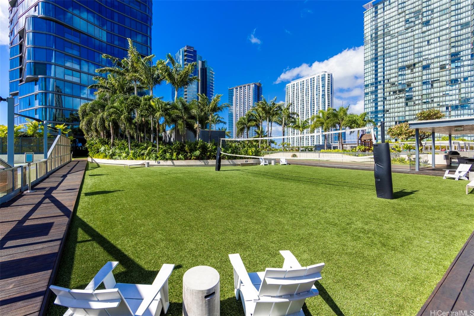 1108 Auahi Street, Unit 3300 Honolulu, HI 96814 - Photo 23 of 25 a view of a chairs and a table in the patio