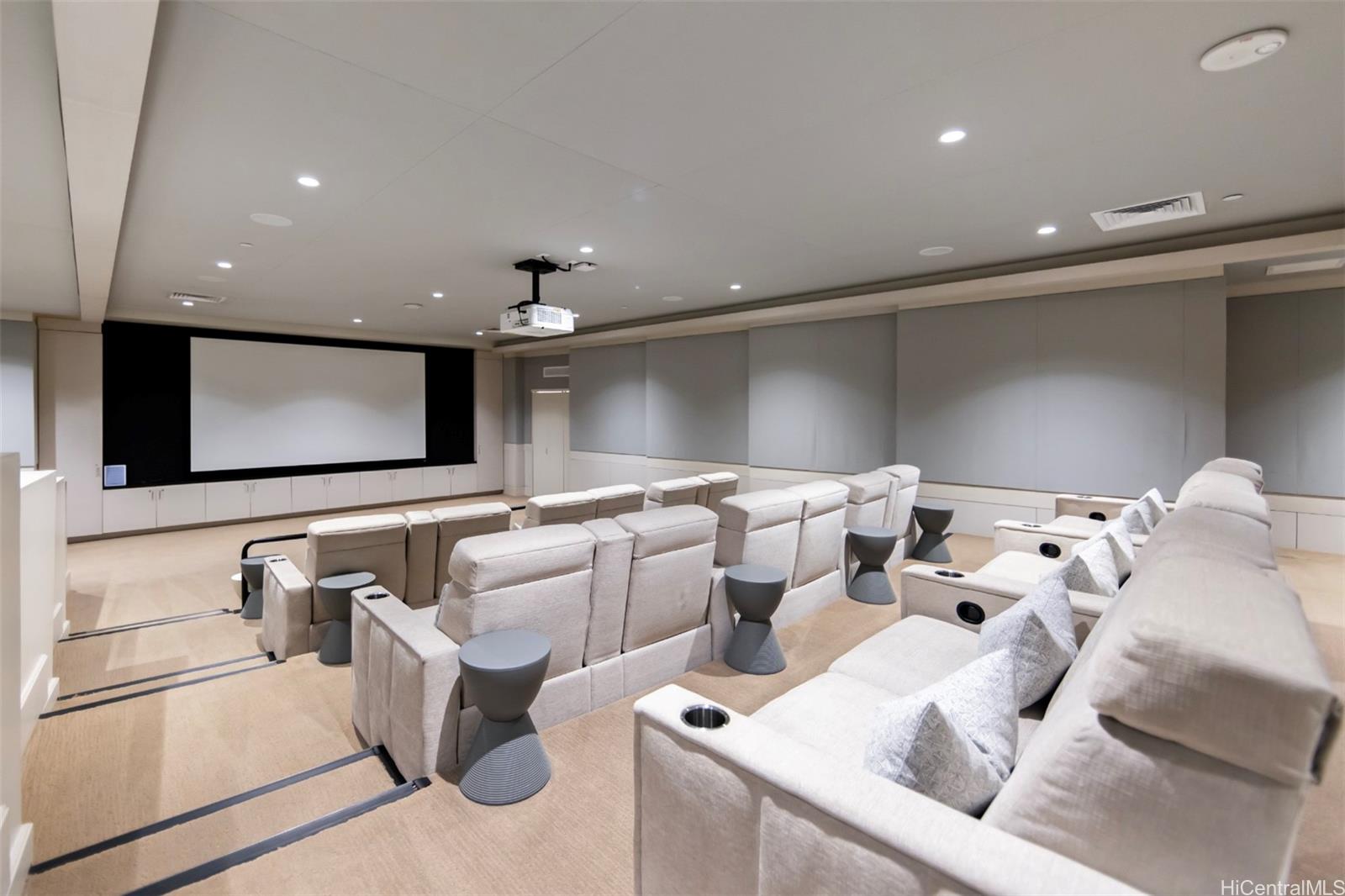 1108 Auahi Street, Unit 3300 Honolulu, HI 96814 - Photo 24 of 25 a living room with furniture and a flat screen tv