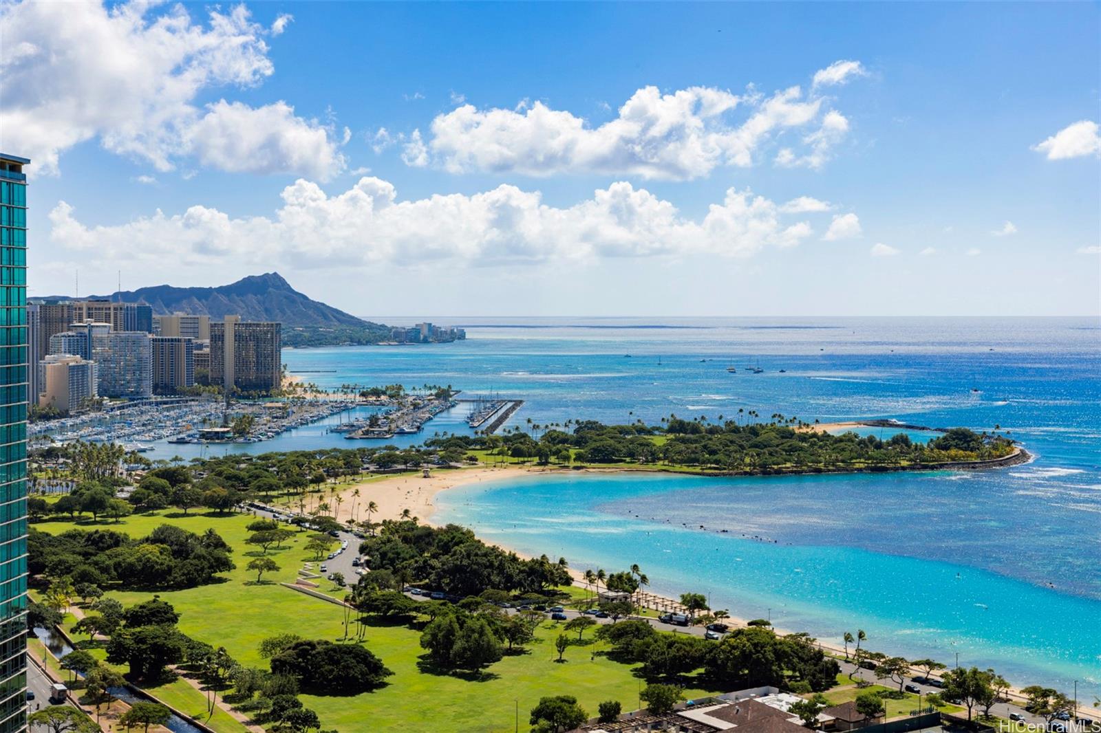 1108 Auahi Street, Unit 3300 Honolulu, HI 96814 - Photo 7 of 25 a view of a city with an ocean beach