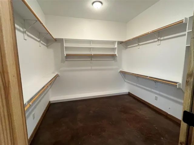 a bathroom with double sink and a mirror