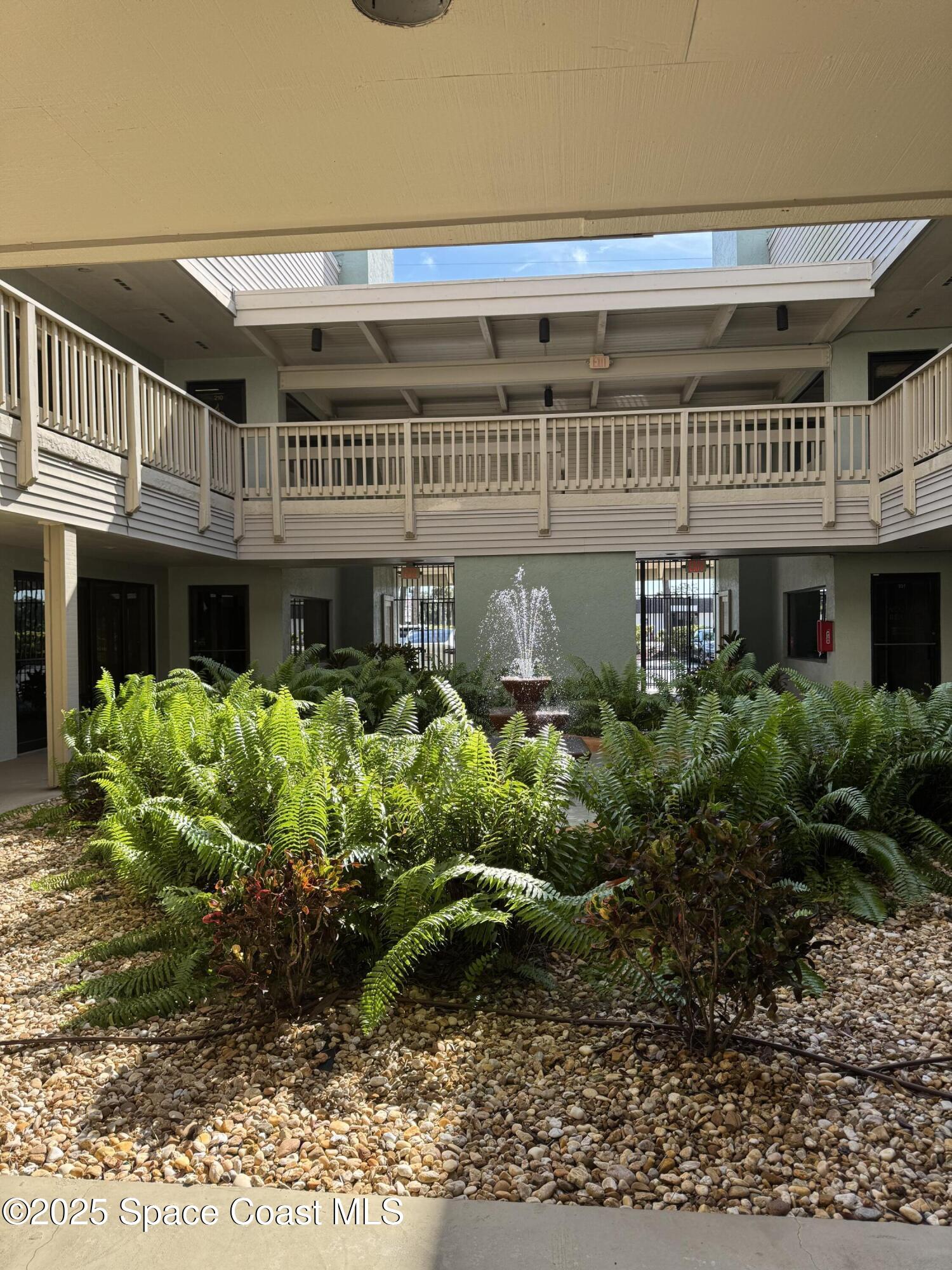 700 North Wickham Road, Unit 101 Melbourne, FL 32935 - Photo 11 of 12 a front view of a building