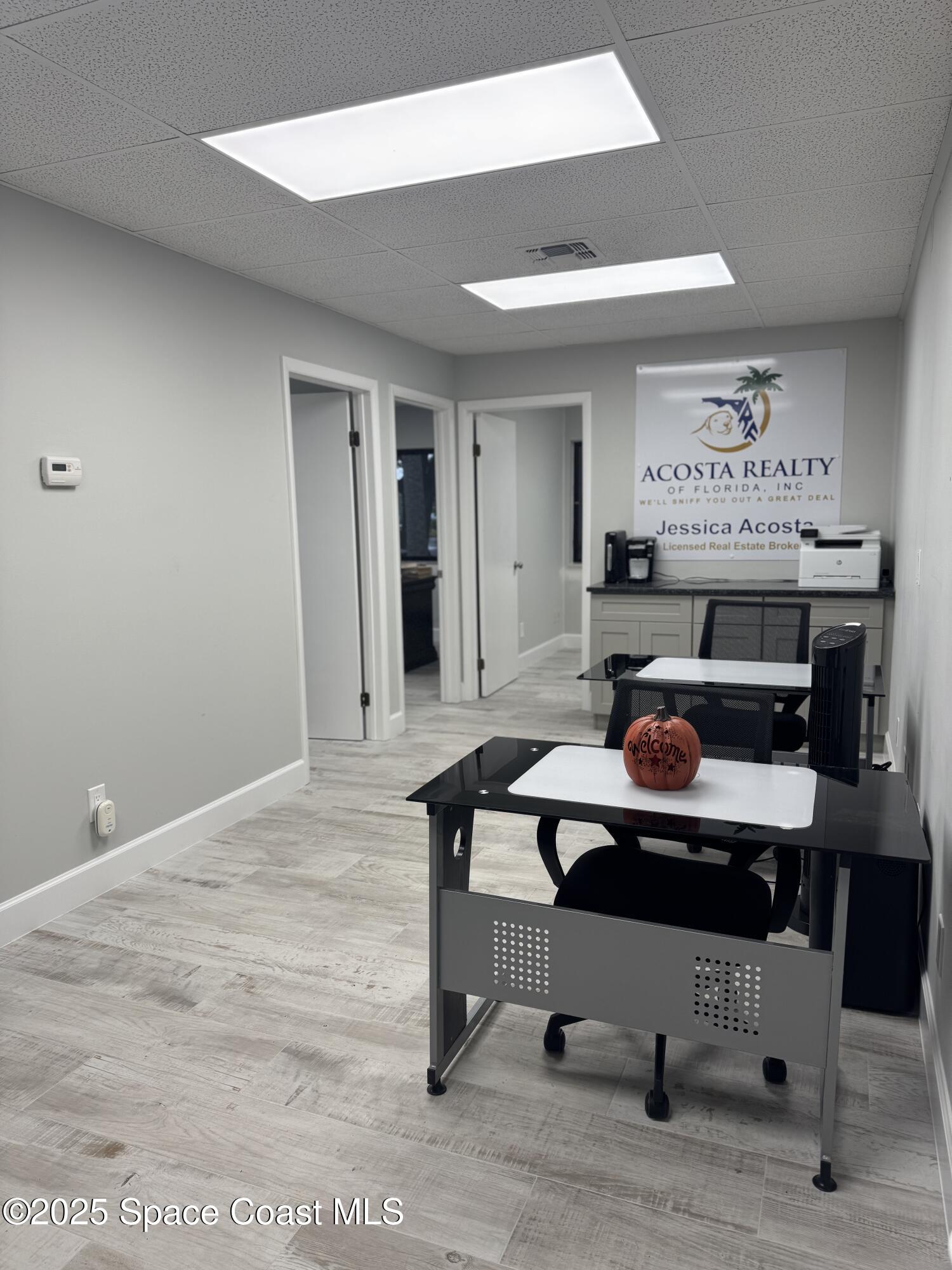 700 North Wickham Road, Unit 101 Melbourne, FL 32935 - Photo 4 of 12 a living room with furniture