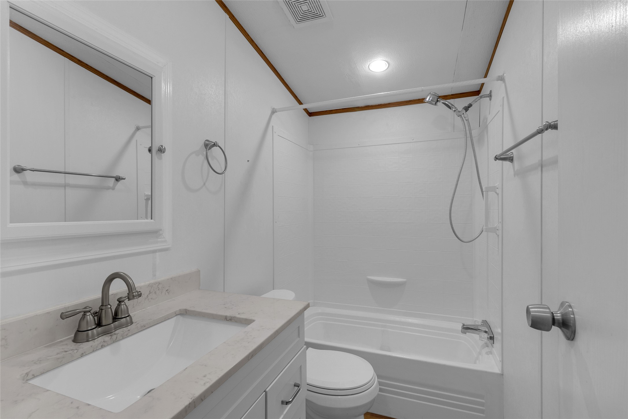 22094 Spear Road Porter, TX 77365 - Photo 27 of 45 a bathroom with a granite countertop sink toilet and shower