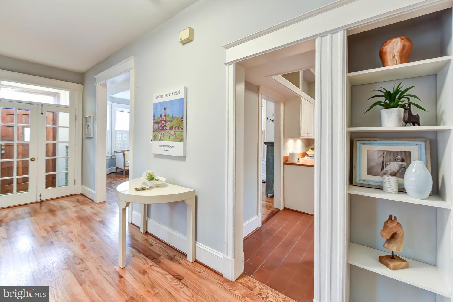 110 13th Street Southeast Washington, DC 20003 - Photo 19 of 58 Bright center hall w/ bookcase & French doors