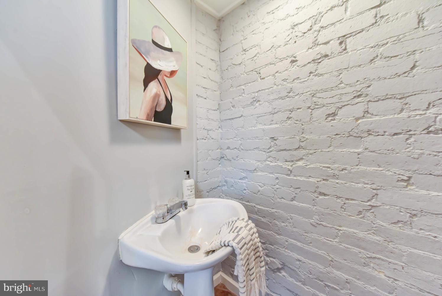 110 13th Street Southeast Washington, DC 20003 - Photo 20 of 58 Powder room discretely located under stairs