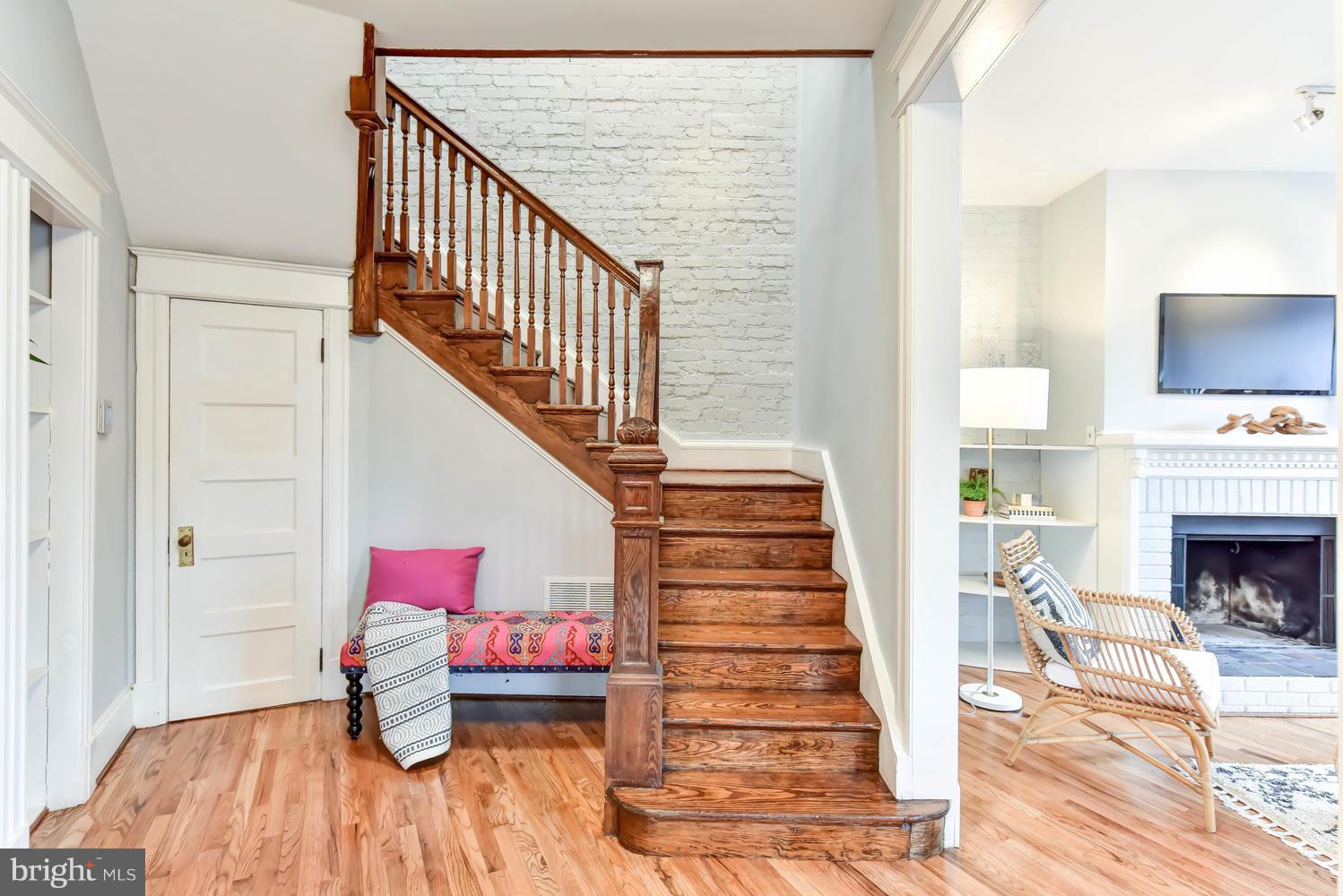 110 13th Street Southeast Washington, DC 20003 - Photo 3 of 58 Powder room discreetly located to left of stairs